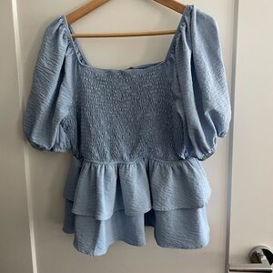 Women’s blue peplum top